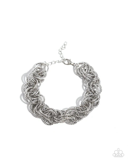 Audible Shimmer - Silver Textured Circle Clasp Bracelet