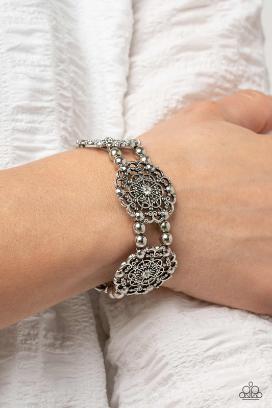 Ornamental Occasion - White Rhinestone Silver Floral Stretchy Bracelet