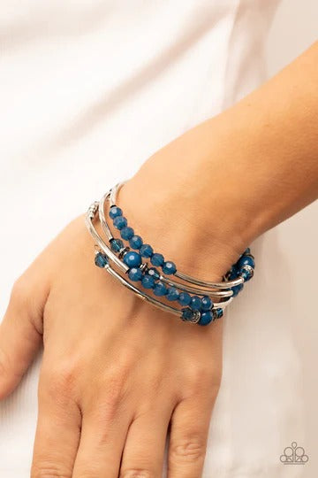 Whimsically Whirly - Blue Bead Silver Coil Bracelet